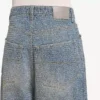 Baggy herenjeans met denimstiksels in donkerblauw