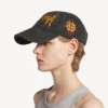 Balenciaga Sacra Cœur-pet voor dames in zwart
