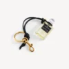 Bedeltje in de vorm van een miniatuurparfumflesje in zwart