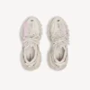 Dames-sneaker uit de Track Signature-collectie in beige/roze