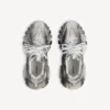 Dames-sneakers met stencil-logo in zwart/wit
