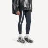 Dames-sneakers met stencil-logo in zwart/wit