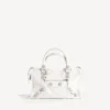 Dames tas ‘City’ klein met grote studs en strass-steentjes in optisch wit