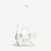 Dames tas ‘City’ klein met grote studs en strass-steentjes in optisch wit