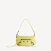 Dames tasje ‘Le City’ met riem in de kleur ‘Lemonade’