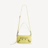 Dames tasje ‘Le City’ met riem in de kleur ‘Lemonade’