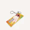 Heren sleutelhanger/bedeltje in de vorm van een snackzakje in geel