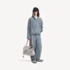 Herenjas met capuchon en denimstiksels in donkerblauw