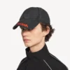 Herenpet met logo in zwart
