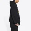Hoodie met college-logo uit ca. 1917, wijde pasvorm “Zwart” 674986TLV901076