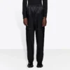 Nylon Track broek met rits “Black” 621435TIO541000