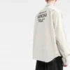 Shirt met ‘Property Of’-opdruk op de rug “Ecru” 703843TKM019800