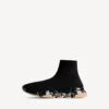 Speed 2.0 herensneaker met volledig doorzichtige zool van gerecycled breiwerk in zwart/beige