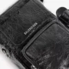 Superdrukke verticale crossbodytas voor heren in zwart